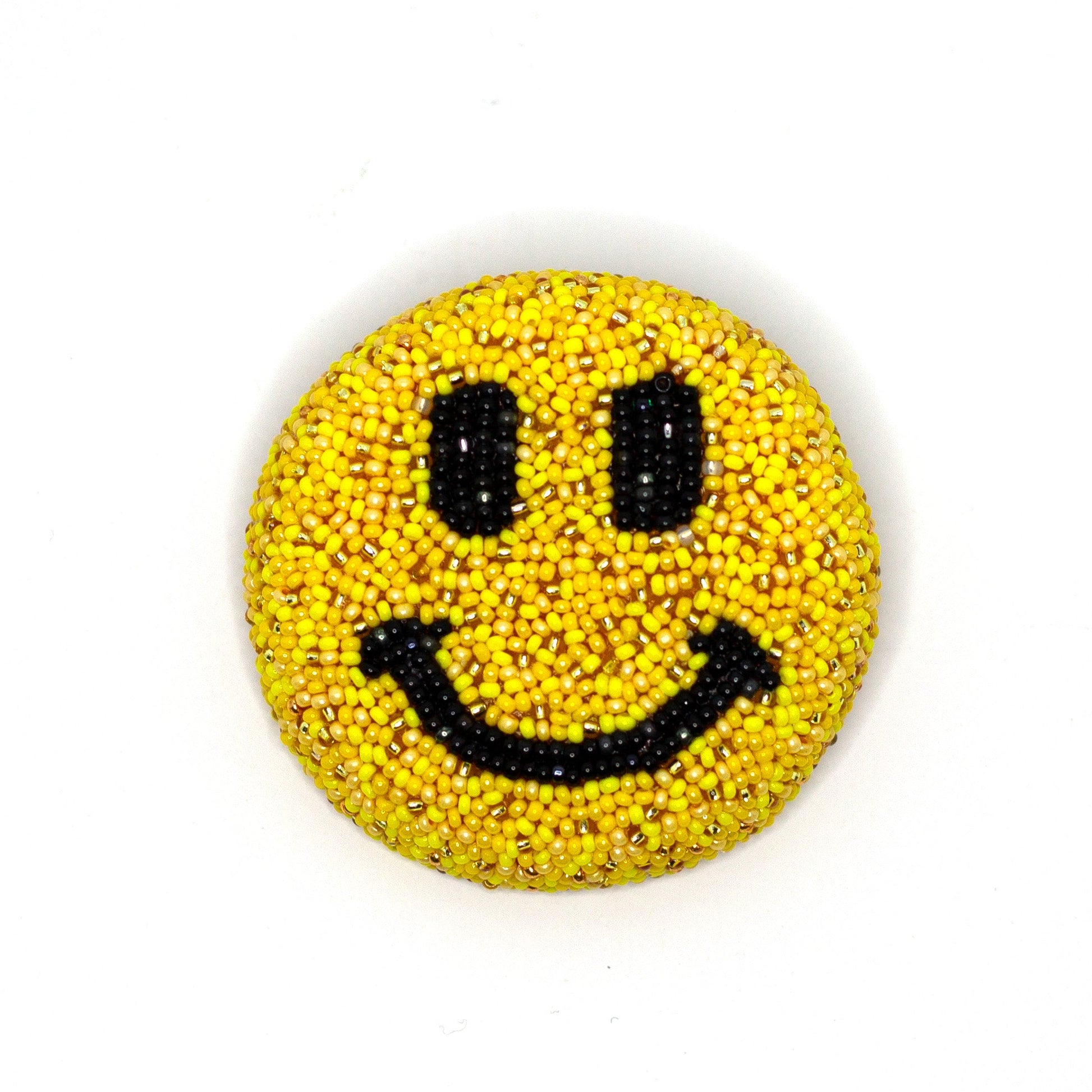 Handmade beaded yellow smiley face brooch shown on a white background.