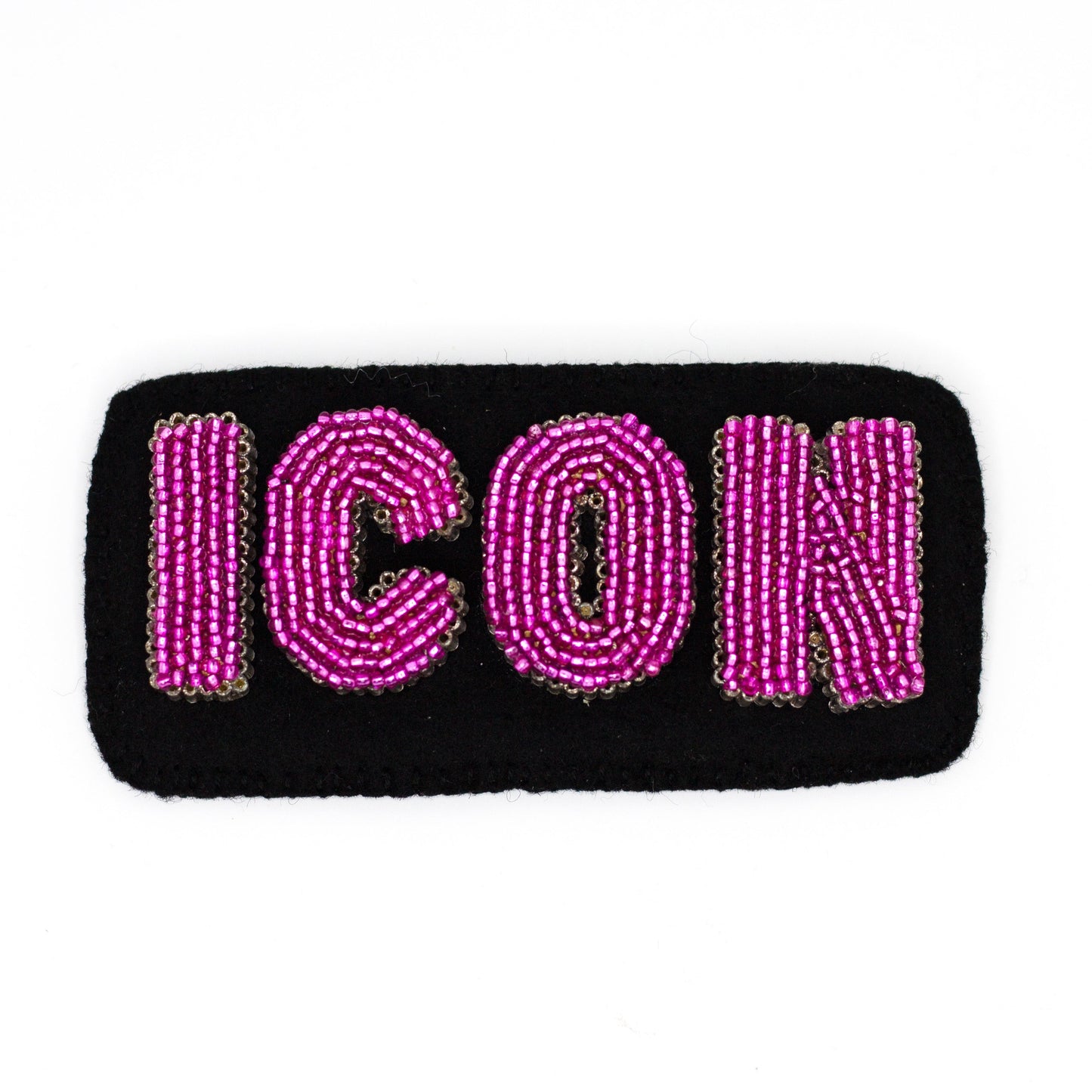 Handmade beaded ICON letter brooch shown on a white background.